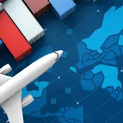 Avión y contenedores industriales sobre mapa